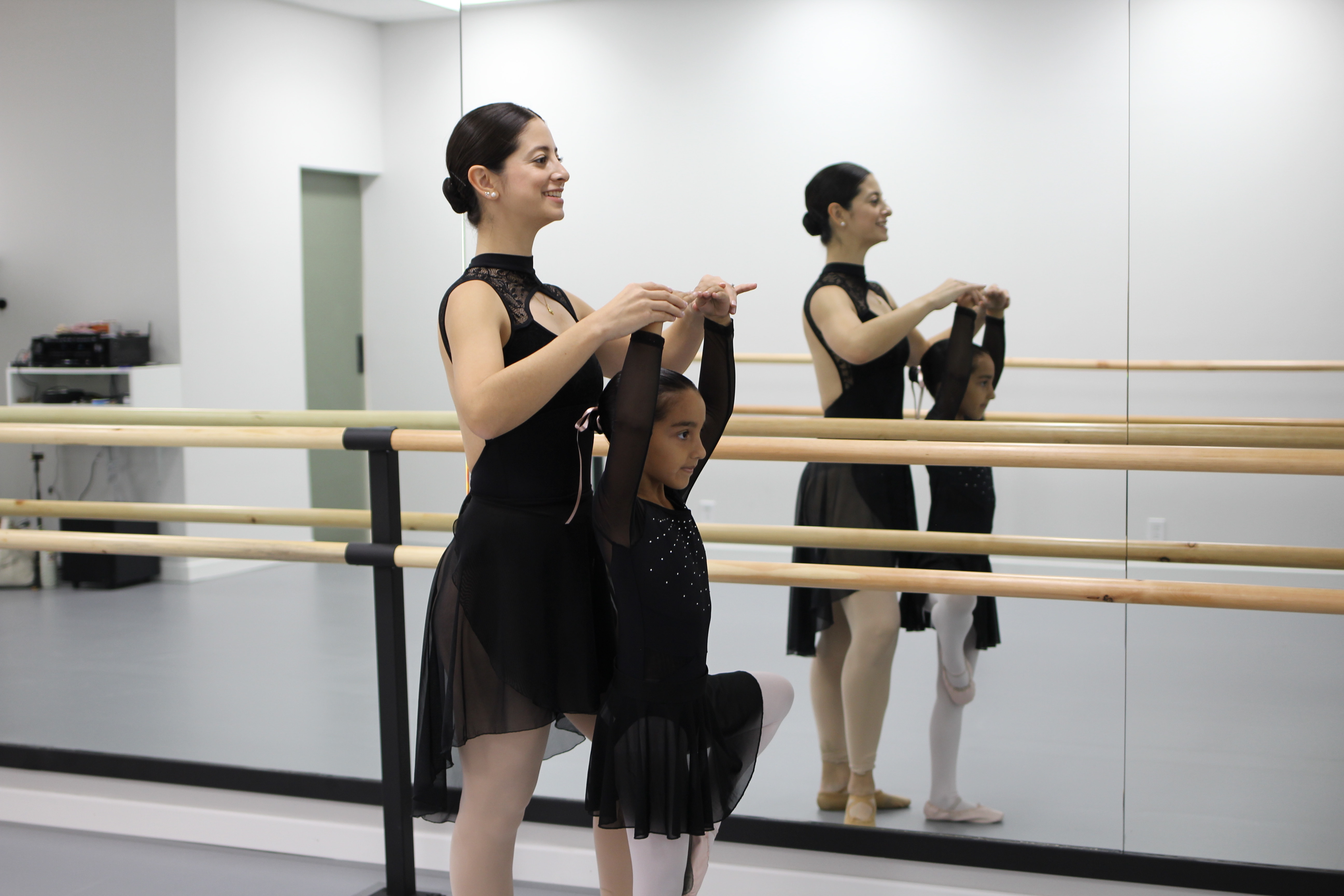Level I students training at the ballet barre